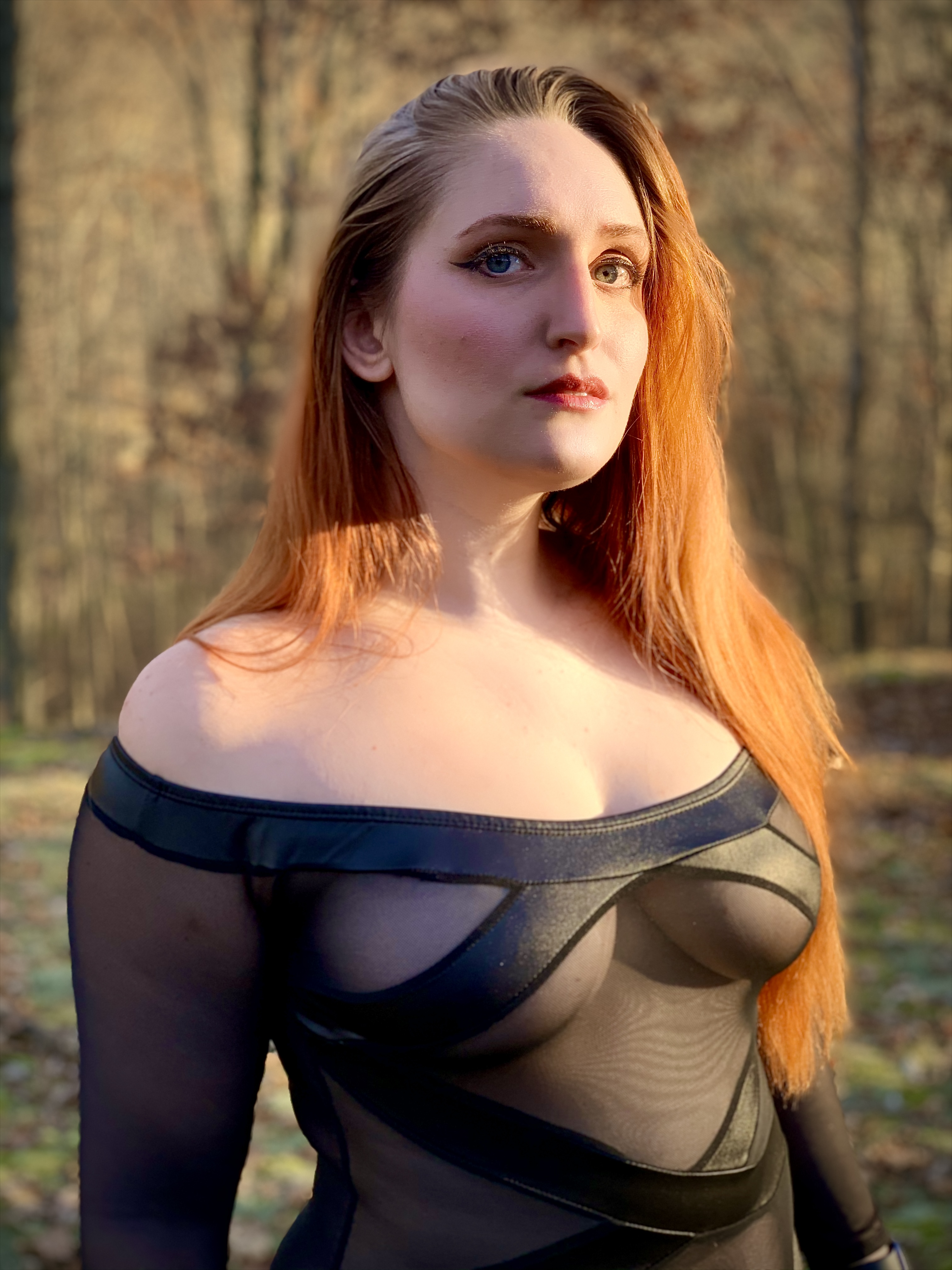 AdorkableGinger outdoors in a black outfit
